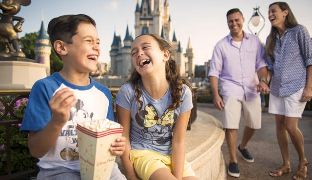 family enjoying the magic kingdom disney theme park